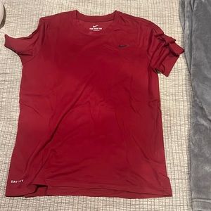 Red Nike t-shirt never worn before. Mint condition